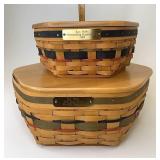 2 Award baskets with lids the smaller one has a