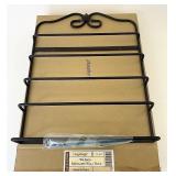 Wrought iron magazine wall rack