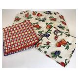 Fruit medley and plaid placemats and napkins