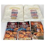 Crisco aprons and cookbooks one has a stain