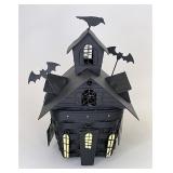 Haunted house with Protector tie on and wrought