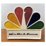 WHIZ TV pottery peacock bank