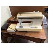 Singer sewing machine and cabinet