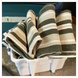 Tote of green towels