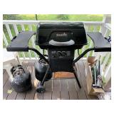 Charbroil grill with two propane tanks