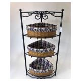 Wrought iron corner shelf with three baskets