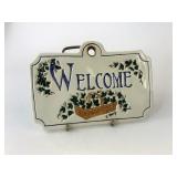 Pottery welcome sign