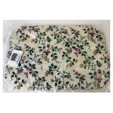 2 white vine placemats