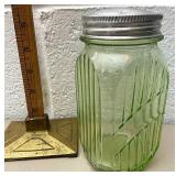 Green depression glass jar with lid