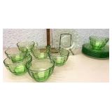 Green depression glass cups and saucers 7 cups