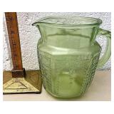 Green depression glass pitcher