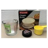 Kitchen scale glass measuring cup and Tupperware