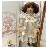 Classic creations porcelain carillon doll