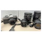 Minolta 35mm camera with lenses