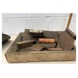 Wood box with masonry tools