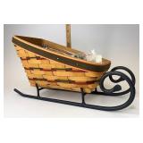 Holiday sleigh with traditional Holly liner