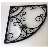 Hammered metal art (left)