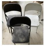 Three metal folding chairs