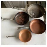 Two copper chef pan and two other pans