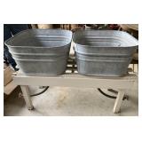 To washtubs with drains and stand