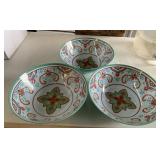 Three plastic bowls