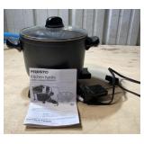 Press the kitchen kettle multi cooker/steamer