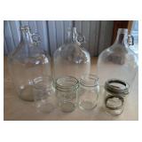 3 1 gallon jugs and 4 jars