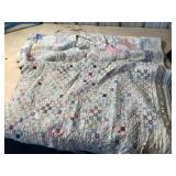 Two quilts both are torn