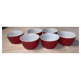 Six red glass cups