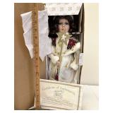 Holiday heritage porcelain doll