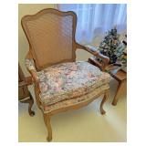 Queen and styled rattan back chair