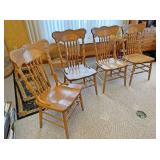 Four Oak dining chairs