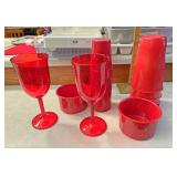 Red plastic ware and granite mugs