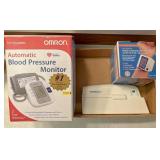 Blood pressure monitors and thermometer
