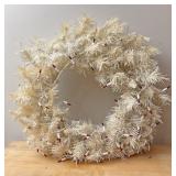 White wreath with red lights