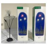 Two Department 56 village accessory fireworks