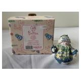 Cute as a button snowman figurine