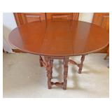 Oval dining room drop leaf table