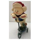 Snowman on a scooter