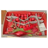 Organizer bin with red Christmas ornaments and