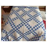 Blue and white patchwork quilt