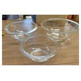 Three Pyrex mixing bowls