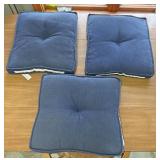 Three blue cushions
