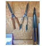 Hand saw and pruners