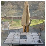 Outdoor tile table with umbrella