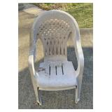 Two plastic outdoor chairs