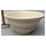 White pottery pink and blue banded mixing bowl
