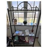 Bakers rack with glass shelves contents not