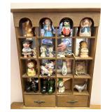 Whatnot shelf full of collectibles