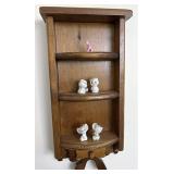 What not shelf with glass house mice and elephant